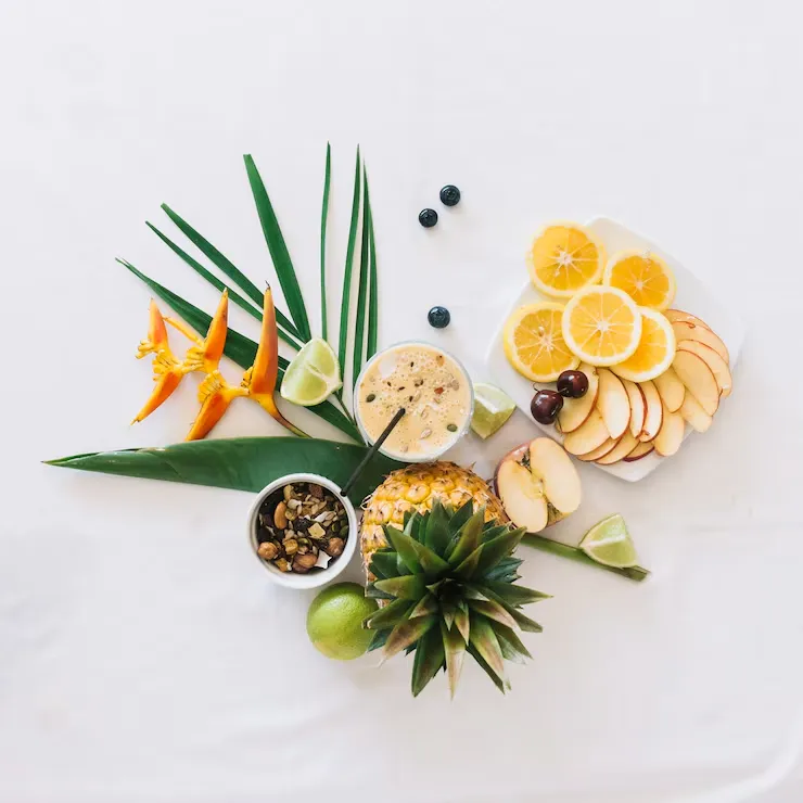 overhead view healthy breakfast with bird paradise flower white backdrop 23 2147907021