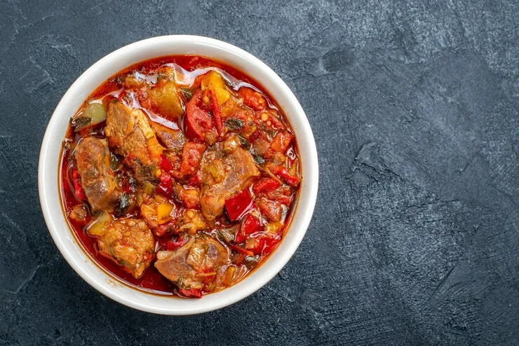 top view vegetable soup with meat inside plate grey 140725 36040